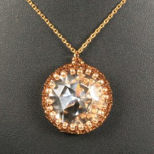 Swarovski rivoli pendant with seed beads